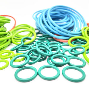 Blue, green and orange sealing rings on a white background