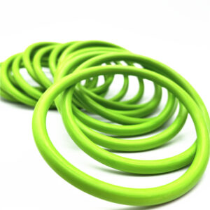 Green sealing rings arranged on a white background